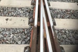 Machining of newly-laid rails